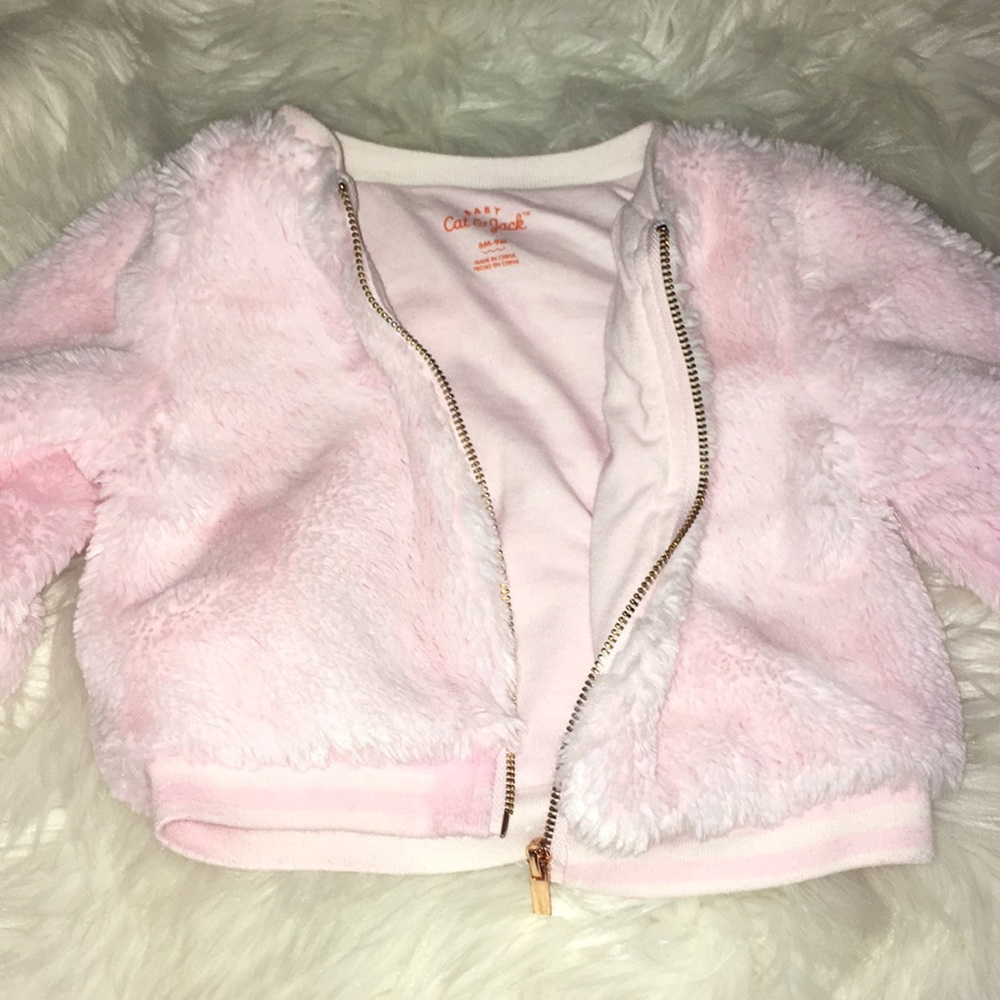 Light pink fuzzy bomber jacket